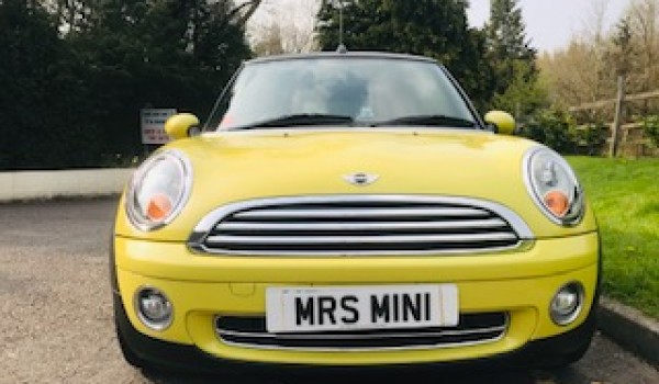 Sharron & Nigel chose this 2009 / 59 MINI Cooper Convertible in Interchange Yellow with Service History & Low Miles