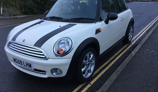 Charlene has chosen this 2009 / 59 MINI Cooper In Pepper White with Chili Pack & Ridiculously LOW MILES