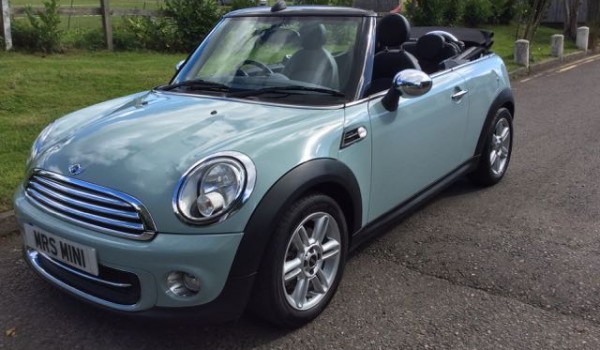 Louise chose this 2012 MINI One Convertible in Ice Blue with Low Miles 36K & Service History