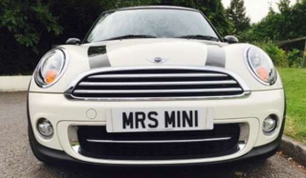 David has treated Margaret to this 2010 MINI Cooper with Chili Pack In Pepper White with Half White Leather & Low Miles 26K