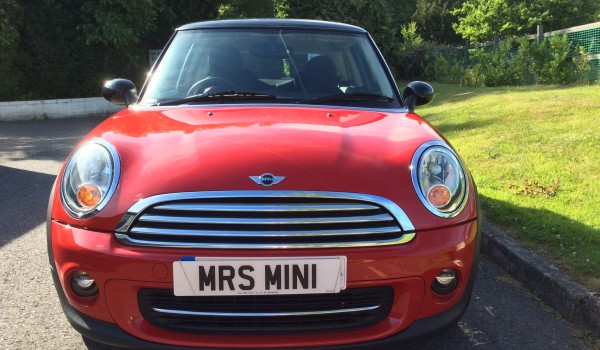 The very pretty Angela helped mum and dad choose this 2011 MINI Cooper in Chili Red AUTOMATIC 34K miles