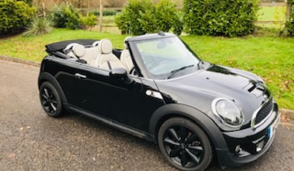 What a lovely Christmas Present this MINI will make!    Off to Cornwall for her….2013 Mini Cooper S Convertible in Black with White Full Leather Interior