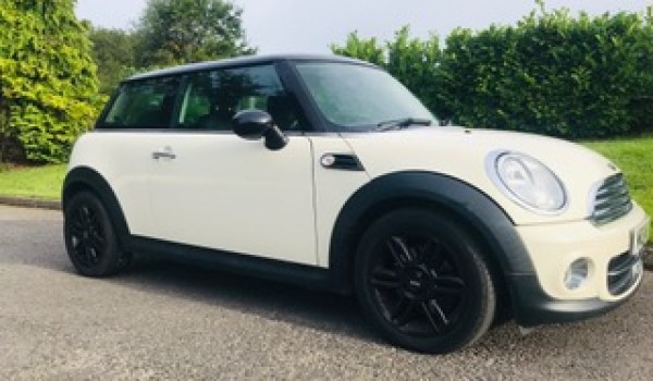 Rebecca has chosen this – now SOLD. 2011 Mini Cooper with Chili Pack Black Alloys and Low Miles