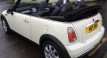 Yasmine chose this 2008 MINI Cooper Convertible Chili Pack in Pepper White