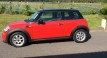 The very pretty Angela helped mum and dad choose this 2011 MINI Cooper in Chili Red AUTOMATIC 34K miles