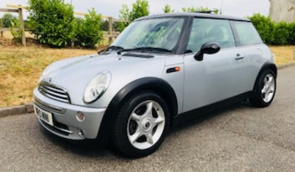 Ben has chosen this 2005 MINI Cooper in Pure Silver with Chili Pack & just 56K miles plus a Panoramic Glass Sunroof