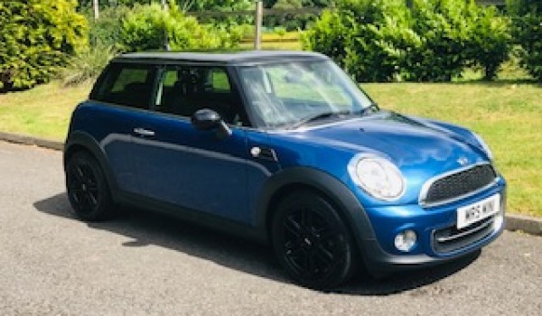 Chris & Kirsty chose this 2012/62 MINI Cooper in Lightening Blue with CHILI Pack & Low Miles