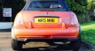 Heidi chose this 2006 MINI Cooper Convertible in Hot Orange with FULL SERVICE HISTORY