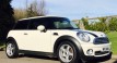 Helen & John have chosen this 2010 MINI Cooper Chili AUTOMATIC with SUNROOF & Half Red Leather Sports Seats