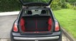 Susan is the lucky lady being treated to this 2004 MINI Cooper Pepper Pack in Astro Black with Sunroof