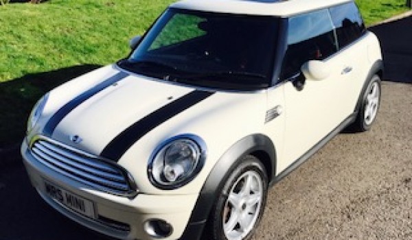 Helen & John have chosen this 2010 MINI Cooper Chili AUTOMATIC with SUNROOF & Half Red Leather Sports Seats