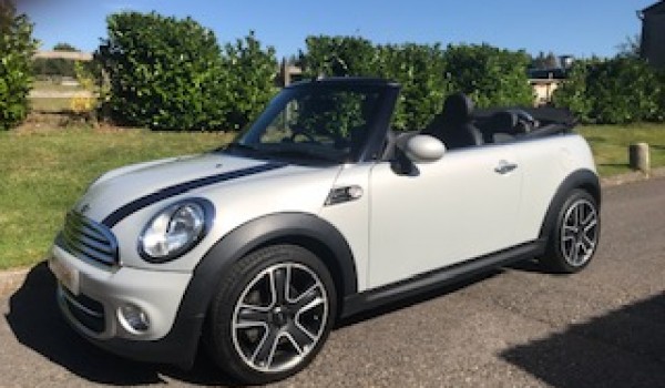 Lindsey chose this 2015 MINI Cooper Convertible with Big Spec and in Great Condition too with Low Miles