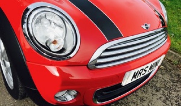 Alex has chosen this 2013 MINI One Convertible Chili Red with Ridiculously Low Miles 10K!