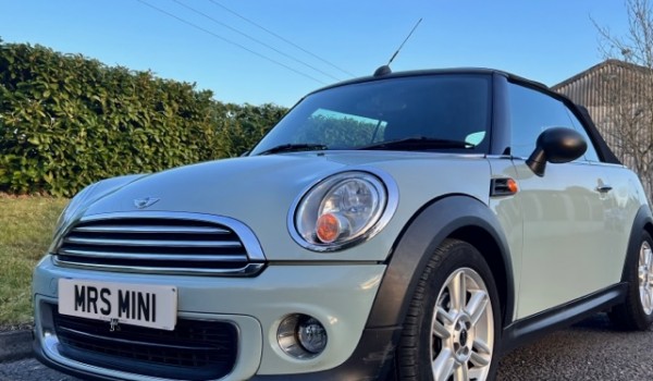 Rachel chose this 2011 MINI One Convertible in Ice Blue LOW MILES & Service History
