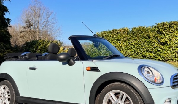 Rachel chose this 2011 MINI One Convertible in Ice Blue LOW MILES & Service History