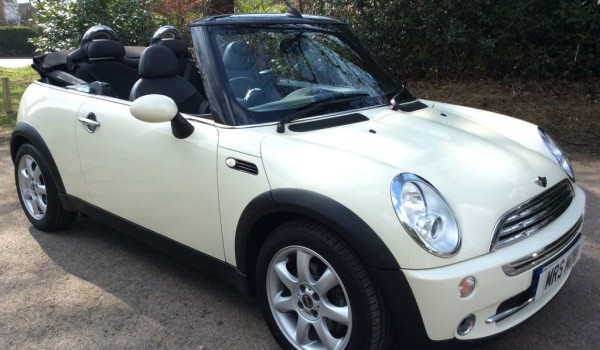 Charlie has taken this 2008 MINI Cooper Convertible in Pepper White with Chili Pack & Low Miles