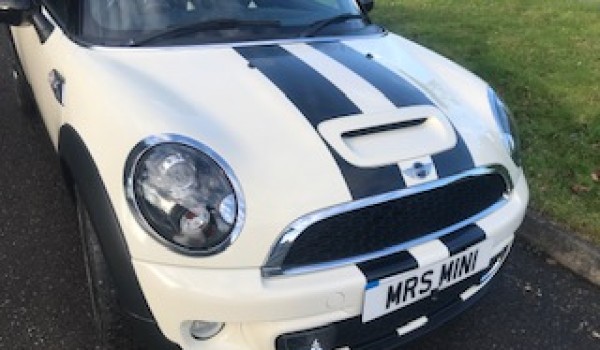 Sue chose this 2012 Mini Cooper S Convertible in Pepper White with Half White Leather Interior & Chili Pack