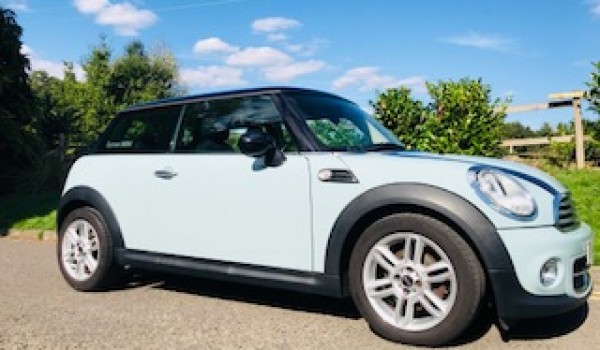 Victoria chose this 2011 MINI Cooper In Ice Blue with Chili Pack & Full Service History