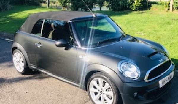 Off to the Isle of Mann for this 2012 MINI Cooper S Convertible in Eclipse Grey with Mault Brown Lounge Leather Heated Sports Seats & LOW MILES + Full Service History