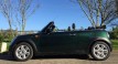 Georgia is having this 2012 MINI Cooper Convertible in British Racing Green & 14K miles Called “HOT PANTS”