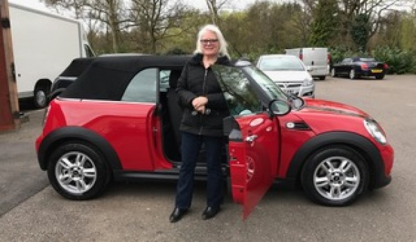 Alex has chosen this 2013 MINI One Convertible Chili Red with Ridiculously Low Miles 10K!