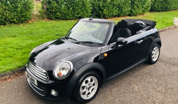 Christina chose this 2013 Mini Cooper Convertible – A rare Automatic