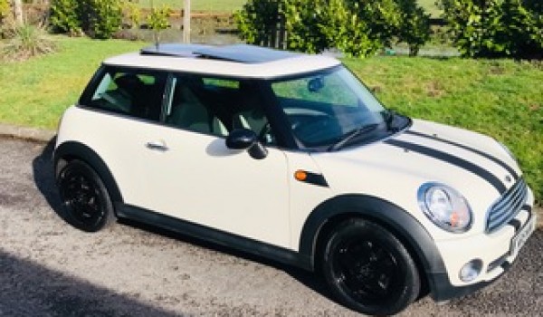 Too late she’s gone to Kent to  live    2007 / 57 MINI One Automatic in Pepper White with Low Miles & HUGE SPEC including Sunroof & half White Leather