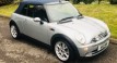 Howard and Beverley chose this 2007 / 57 MINI Cooper Convertible in Pure Silver with Blue Hood & Full Leather Heated Sports Seats