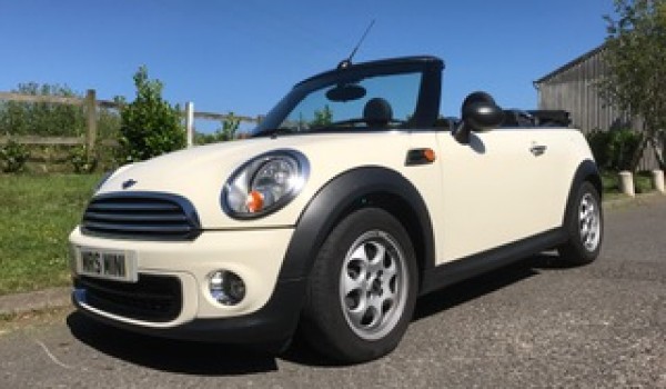 An Anniversary present for a lucky wife – 2011 MINI One (Salt Pack) Convertible in Pepper White with Ridiculously Low Miles 12K!