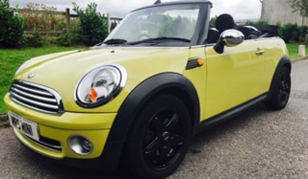 Andrew & Fiona have chosen this 2009 MINI Cooper Convertible with Chili Pack in Interchange Yellow with Heated Sports Seats & LOW MILES