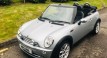 Howard and Beverley chose this 2007 / 57 MINI Cooper Convertible in Pure Silver with Blue Hood & Full Leather Heated Sports Seats