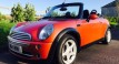 Heidi chose this 2006 MINI Cooper Convertible in Hot Orange with FULL SERVICE HISTORY