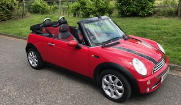 Virginia has chosen this MINI 2007 / 57 MINI Cooper Convertible in Chili Red inside & out! With Chili Pack & so much more