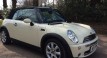 Charlie has taken this 2008 MINI Cooper Convertible in Pepper White with Chili Pack & Low Miles