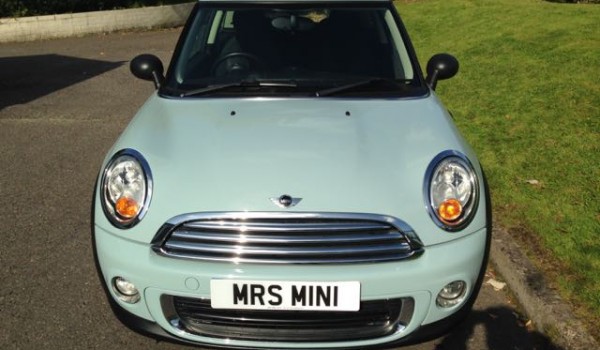 Helen chose this “Baby Blue”  2011 MINI One with Very Low Miles