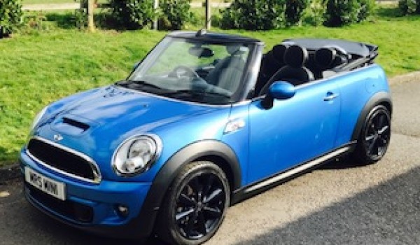 Maggie chose this 2011 Mini Cooper S Convertible in Lazer Blue with Huge Spec – the second time we sold this MINI too!