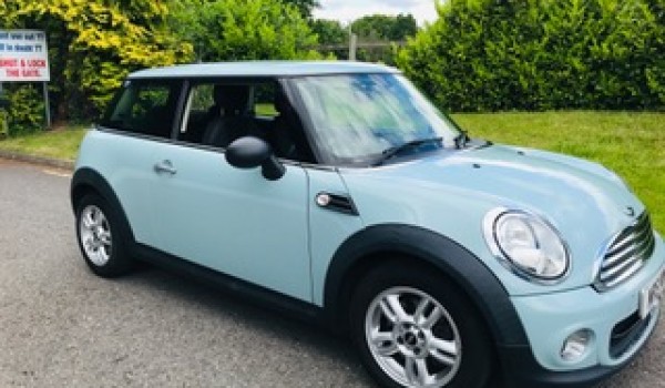 Mia has chosen this 2011 MINI One in Ice Blue with History and Bluetooth