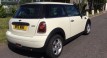 The Lovely Sammy & her partner seem pleased with their 2009 / 59 MINI ONE 1.4 IN PEPPER WHITE – with Air Con & Alloys